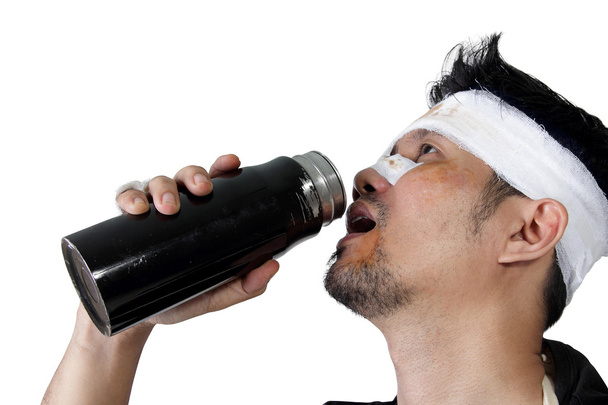Muž pije láhev vody, samostatný - Fotografie, Obrázek