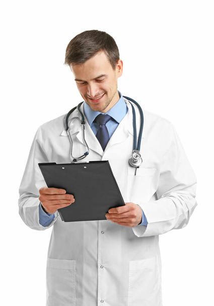 Doctor with clipboard isolated on white - Фото, зображення