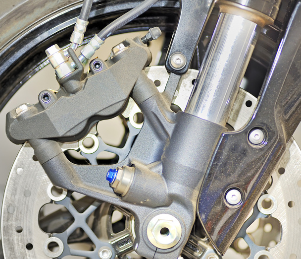 Close-up detail van een motorfiets voorwiel - Foto, afbeelding