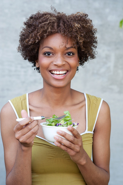 Pretty African American woman with salad - Φωτογραφία, εικόνα