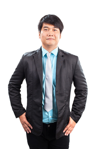 portrait of younger asian man wearing western suit standing and  - Фото, зображення