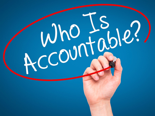 Man Hand writing Who Is Accountable? with black marker on visual - Photo, Image