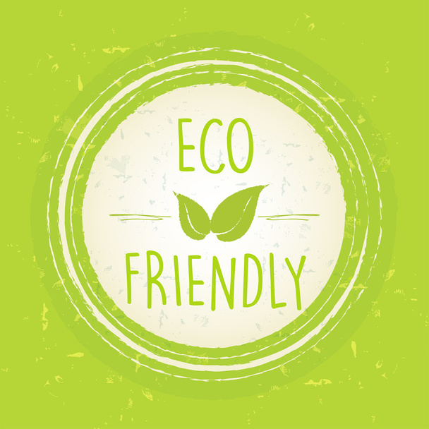 eco friendly with leaf sign in circle over green old paper backg - Photo, image