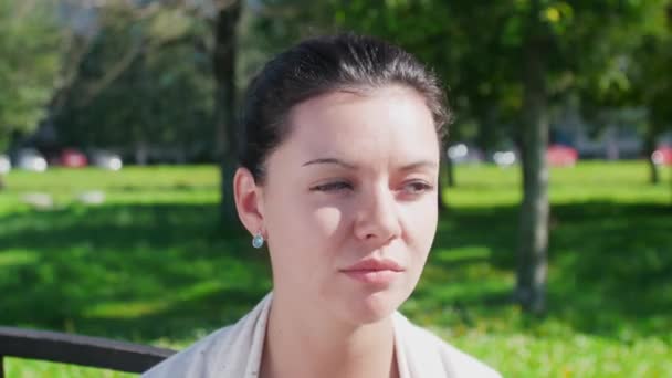 Portrait of sad young woman outdoor, close up - Footage, Video