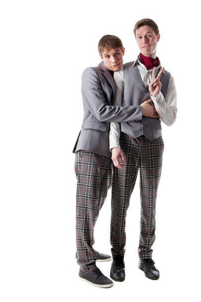 Bashful students in checkered pants - Foto, imagen
