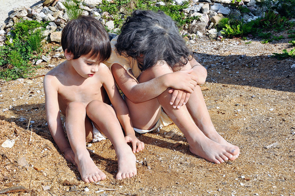 Poverty and poorness on the expression of children - Foto, immagini