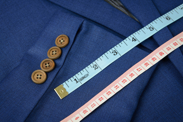ruban de mesure sur costume bleu
 - Photo, image
