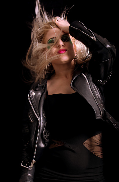 Pretty blonde woman with leather jacket - Foto, Imagem