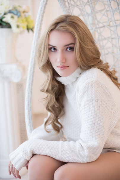 Portrait of beautiful blonde girl in pullover  - Photo, Image