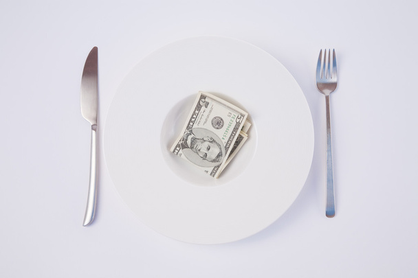 dish with dollar banknotes - Photo, image