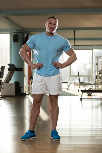 Portrait Of A Physically Fit Man In T-Shirt - Foto, Bild