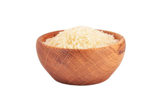arroz en un tazón de madera - Foto, imagen