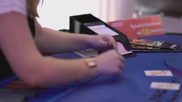 Gambling Black Jack in a casino - dispensing cards from a sled - Кадры, видео