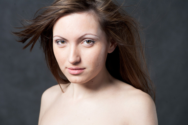 Portrait of a young brunette lady - Foto, Imagen