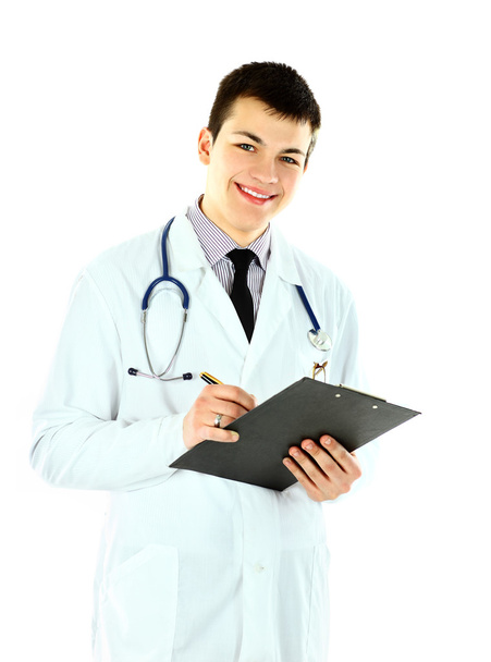 A young male doctor against white background - Fotoğraf, Görsel