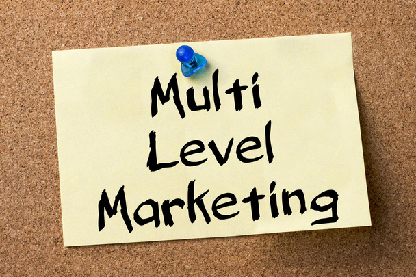Multi Level Marketing MLM - клейка етикетка, закріплена на буклеті
 - Фото, зображення