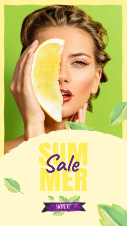 Platilla de diseño Summer Sale with Woman holding Pomelo fruit Instagram Story
