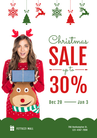 Template di design Christmas Sale with Woman Holding Present Poster