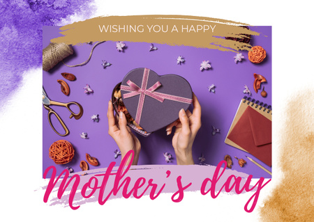 Platilla de diseño Mother's Day Greeting with Heart-Shaped Gift Box Card