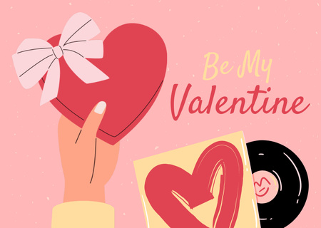 Platilla de diseño Happy Valentine's Day Greeting with Gift Box in Hand Card