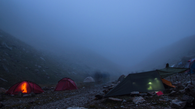 Tent town in the foggy Mountains Zoom Background Design Template