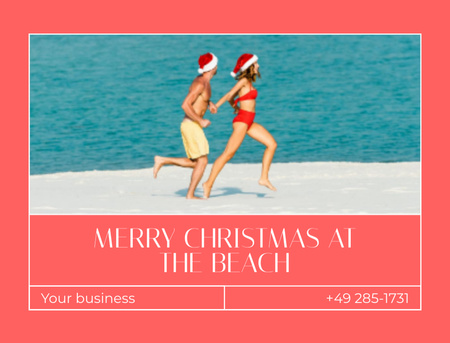 Platilla de diseño Young Couple in Christmas Santa Hats Running at Sea Beach Postcard 4.2x5.5in