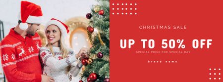 Platilla de diseño Couple Decorating Christmas Tree on Sale Announcement Facebook cover