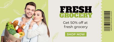 Platilla de diseño Young Couple with Grocery Store Paper Bag Coupon