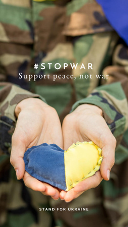 Soldier holding Heart in Ukrainian Flag Colors Instagram Story tervezősablon