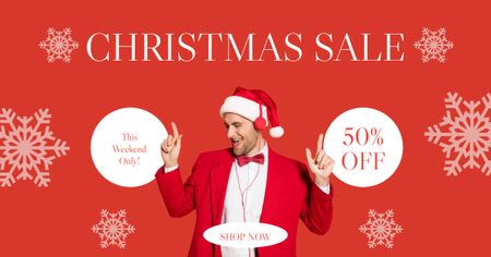 Man Having Fun in Earphones on Christmas Offer Red Facebook AD Design Template