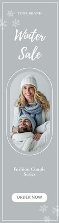 Winter Sale Ad with Couple in Warm Knitwear Skyscraper Design Template