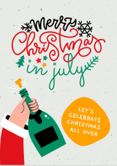 Celebrating Christmas in July with Bottle of Champagne in Hand