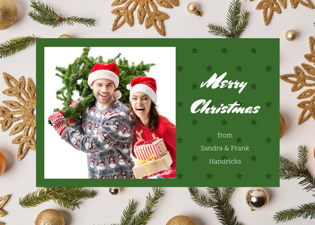 Plantilla de diseño de Christmas Cheers With Happy Couple Carrying Fir Tree Postcard 5x7in 