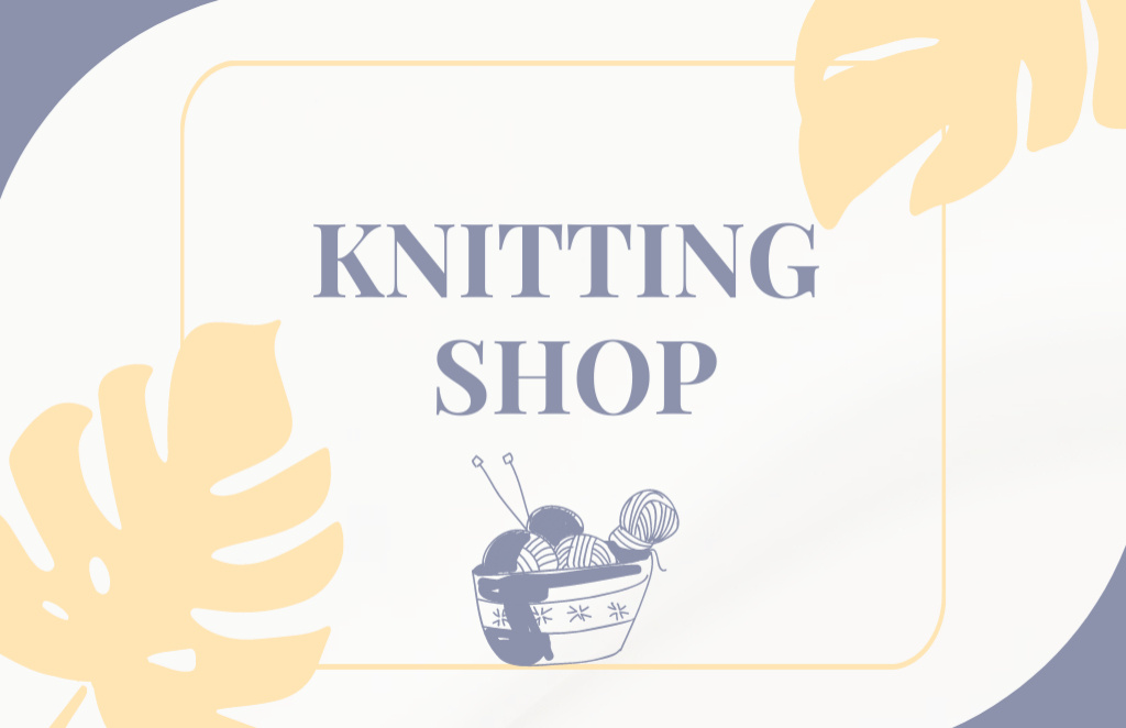 knitting Shop Ad with Leaves and Knitting Yarn in Basket Business Card 85x55mmデザインテンプレート