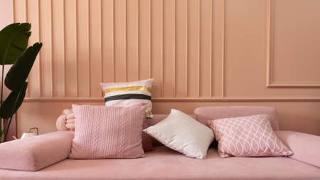 Szablon projektu poduszki na kanapie w różowym pokoju Zoom Background